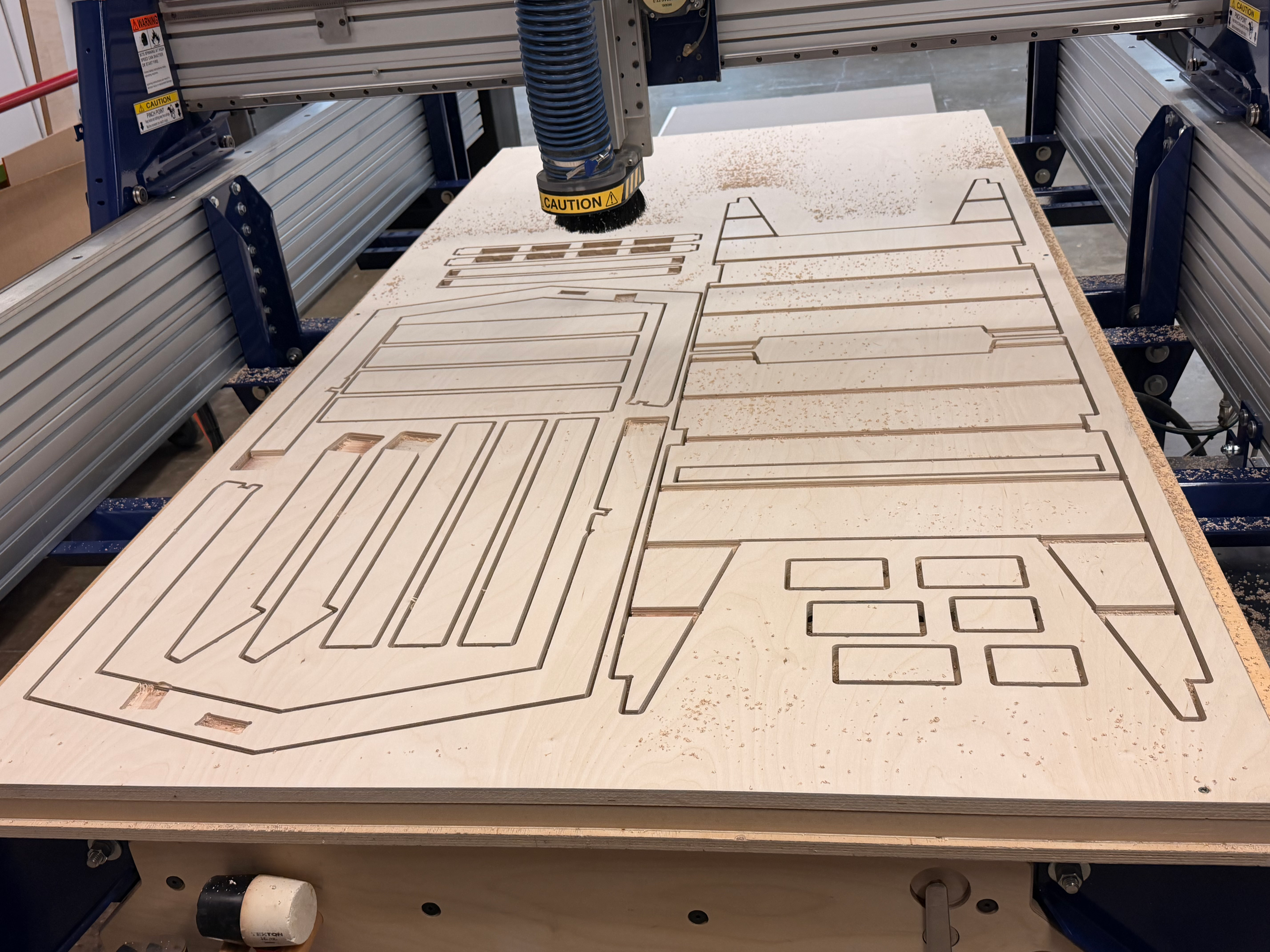 CNC machine cutting all chair parts in one pass