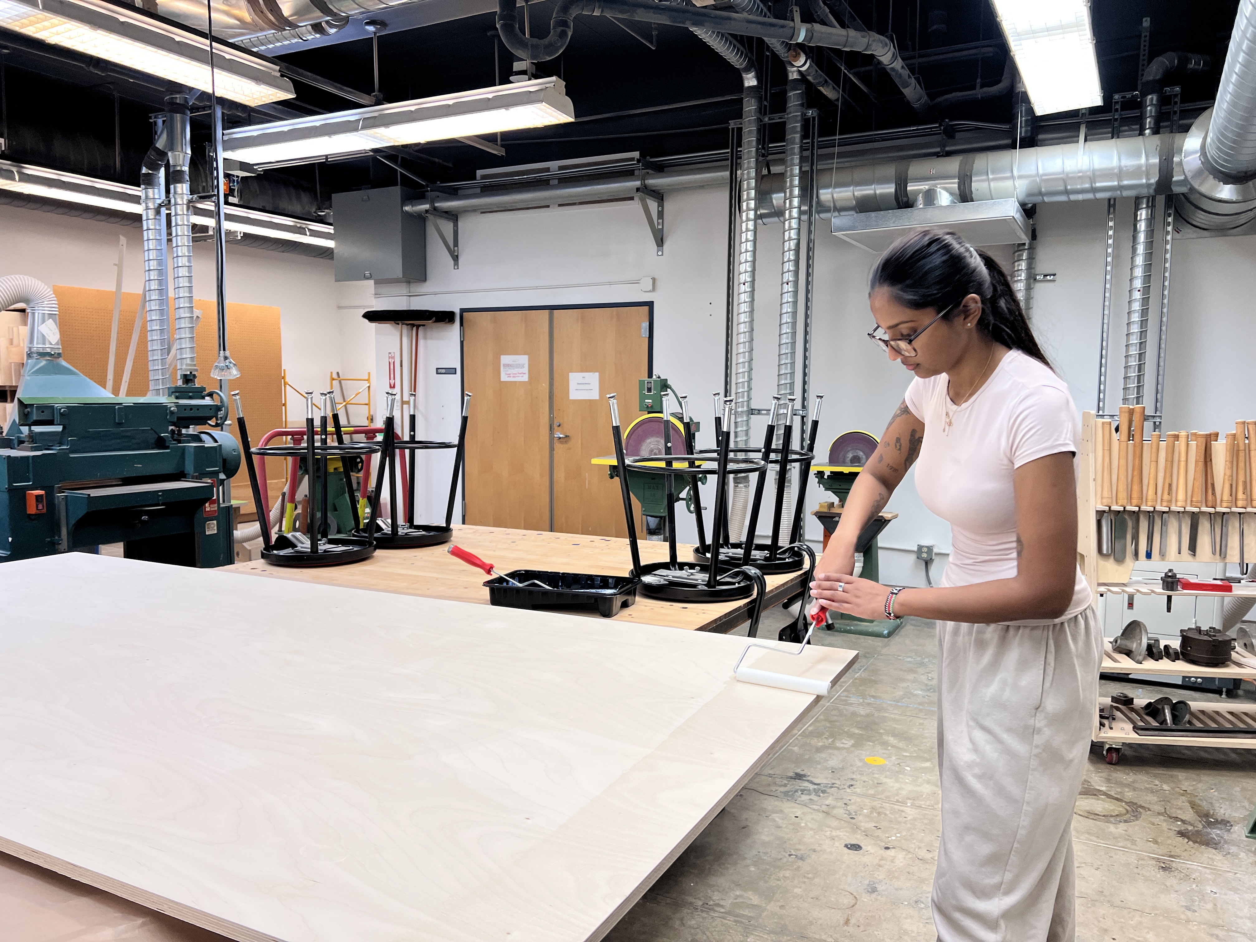 varnishing the sanded plywood